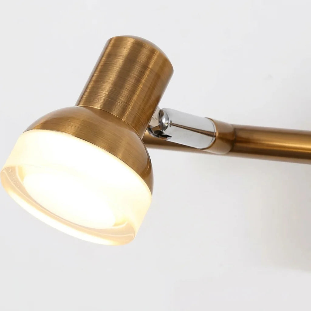 Spot orientable en bronze et diffuseur acrylique, vu de près
