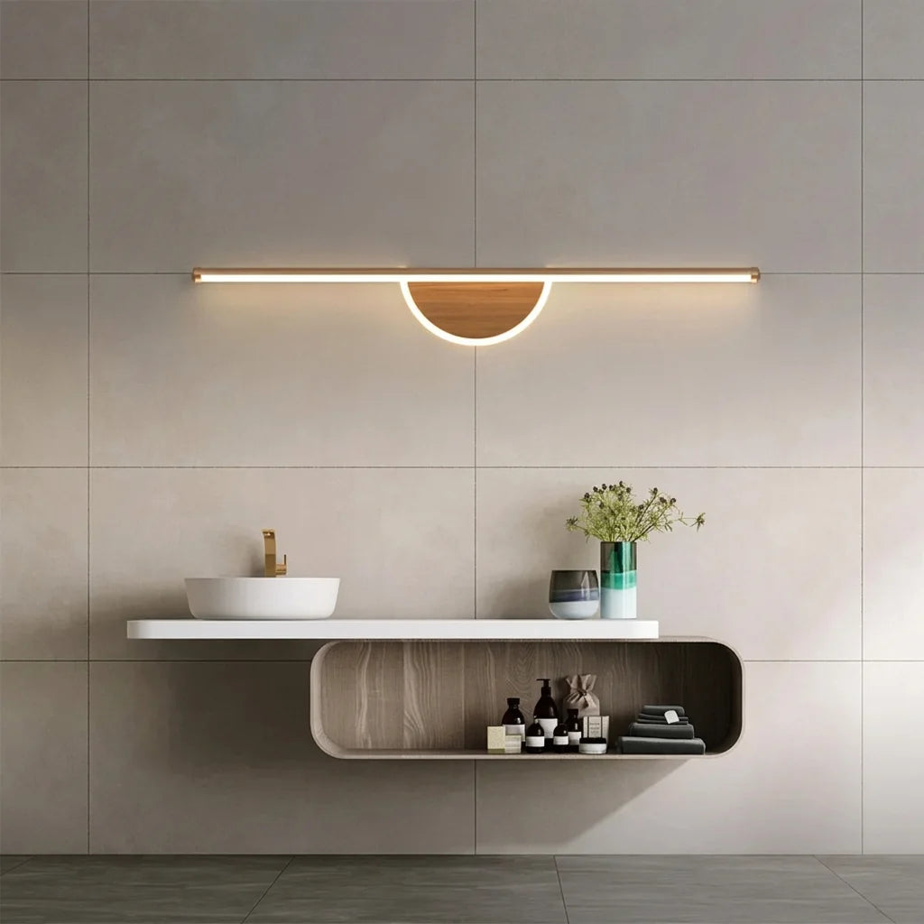 Applique barre demi-lune au-dessus d'un plan vasque suspendu, salle de bain grise