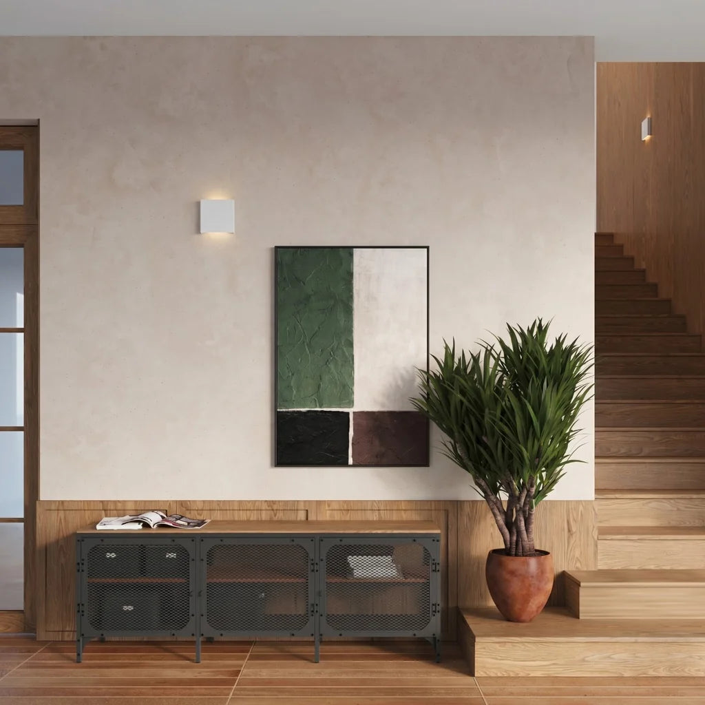 Applique murale carrée en acier dans un salon