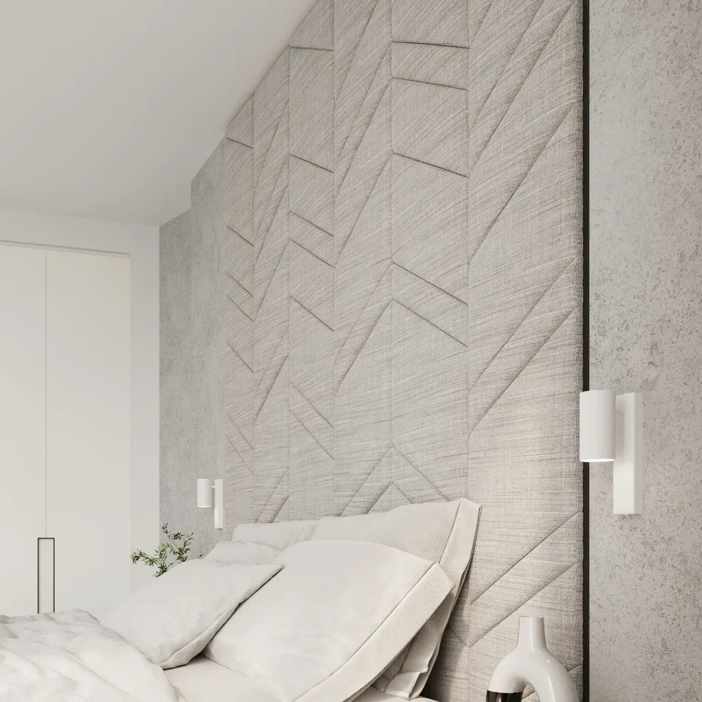 Applique murale cylindre sur platine dans une chambre