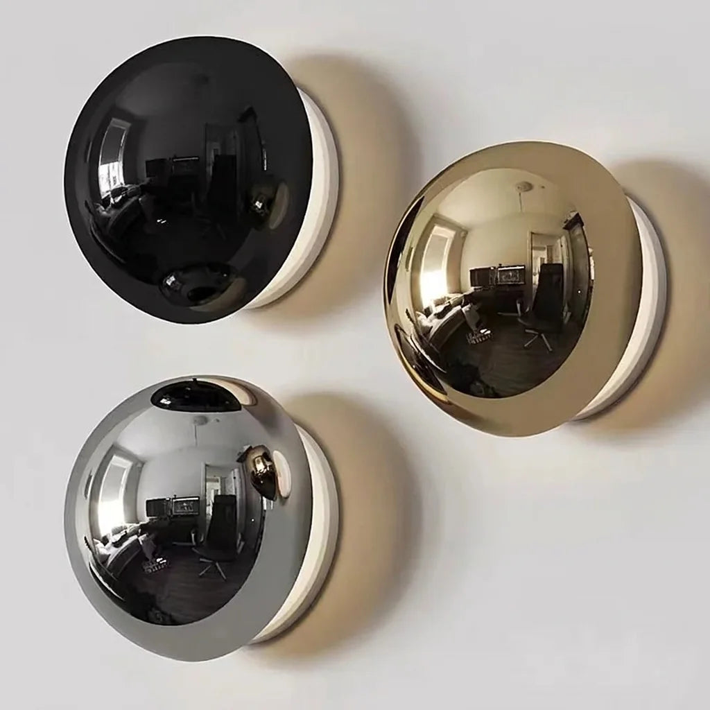 Trois appliques demi-sphère miroir noire, or et argent