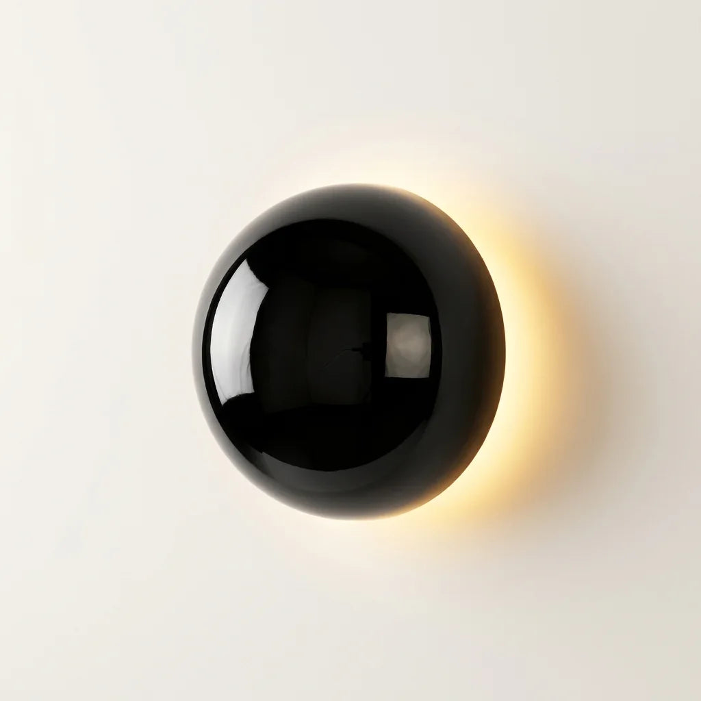 Applique murale dôme noir miroir effet éclipse lunaire, allumée