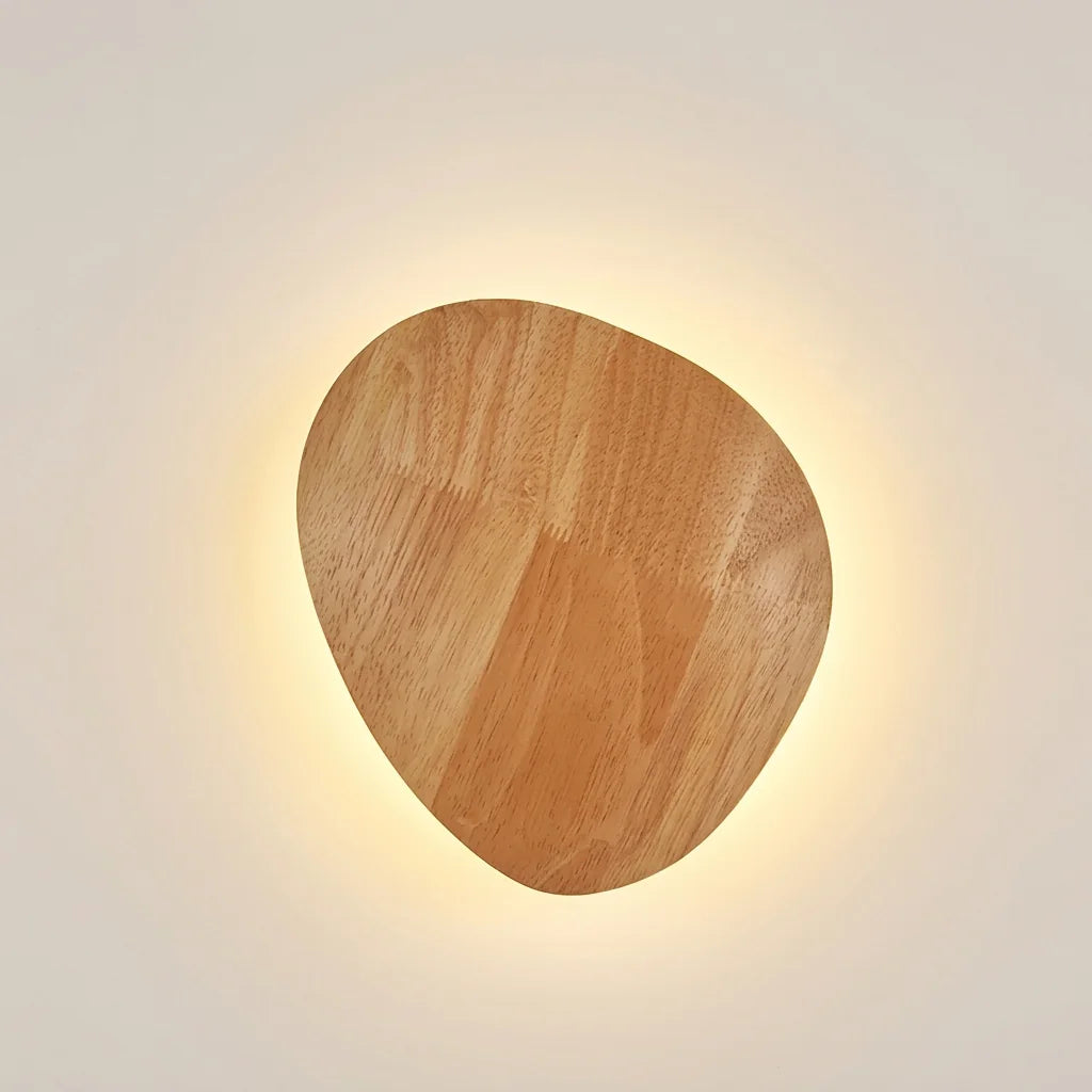 Applique murale LED en bois forme galet rétroéclairée, allumée