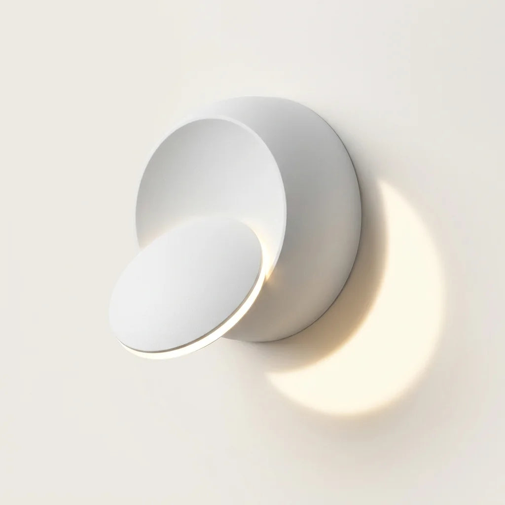 Applique murale LED éclipse blanche à disque orientable, allumée