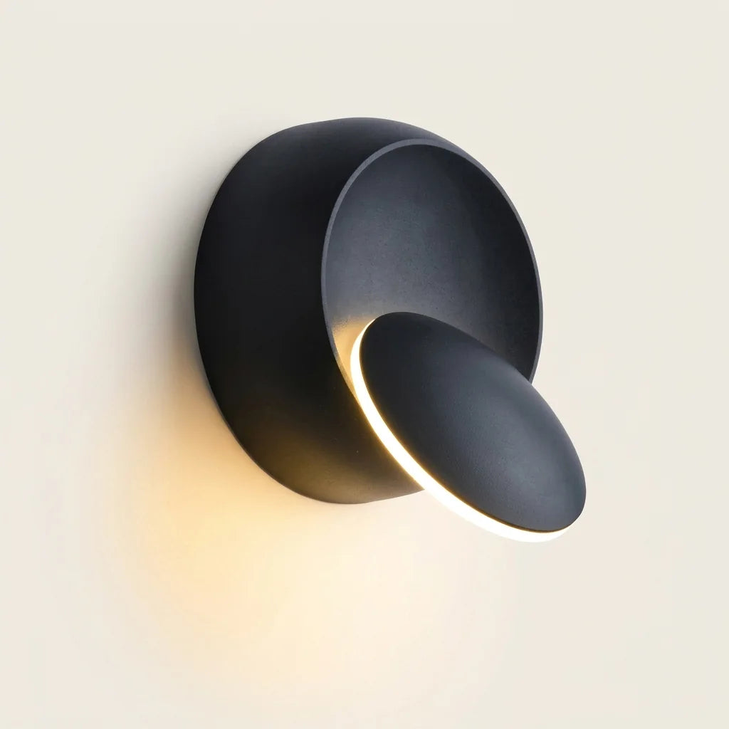 Applique murale LED éclipse noire à disque orientable, allumée