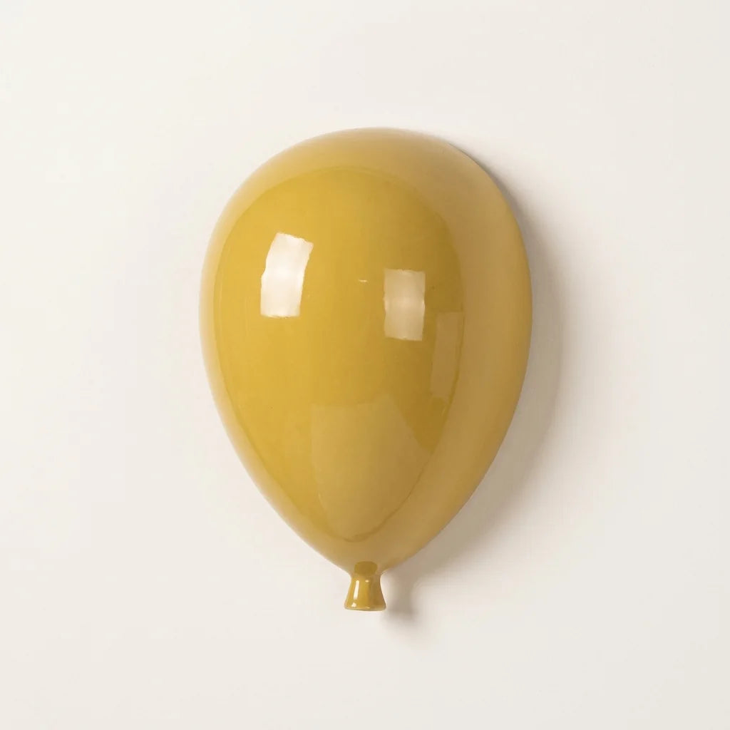 Ballon mural en céramique jaune brillante