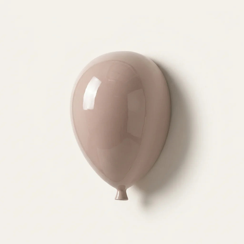 Ballon mural en céramique rose poudré brillante
