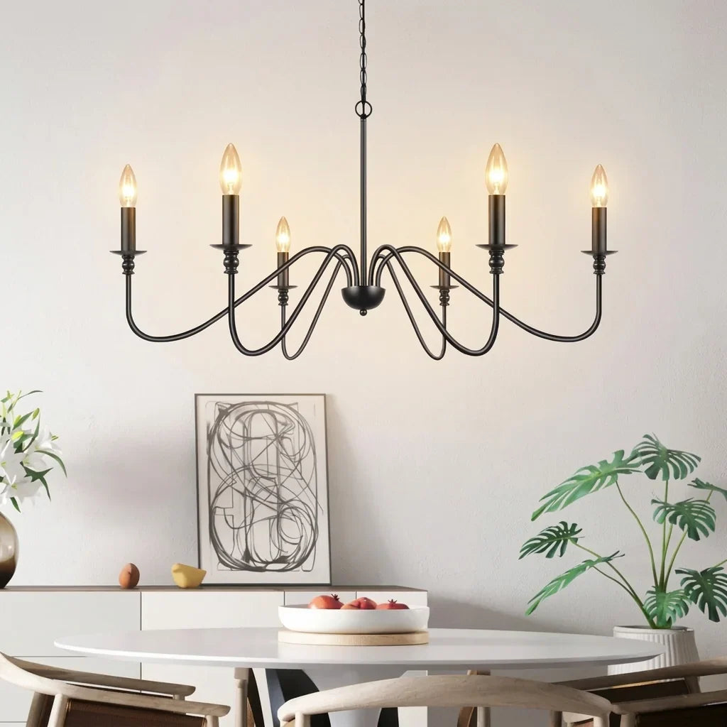 Lustre bougies noir au-dessus d’une table ronde