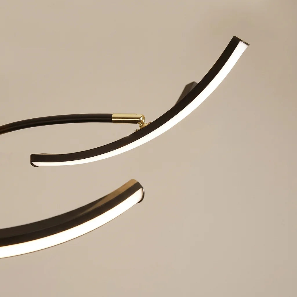 Bras LED orientable et articulation couleur laiton en gros plan