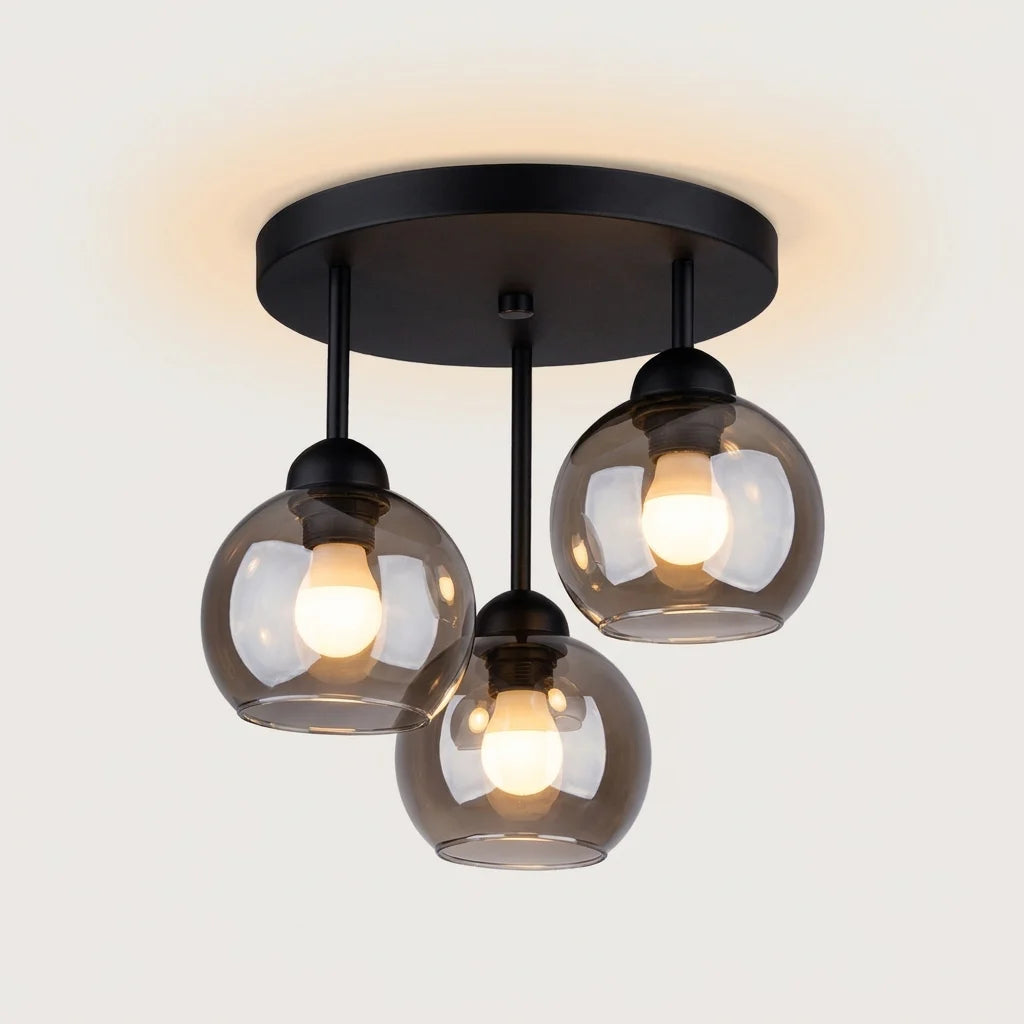Plafonnier 3 globes en verre fumé allumé