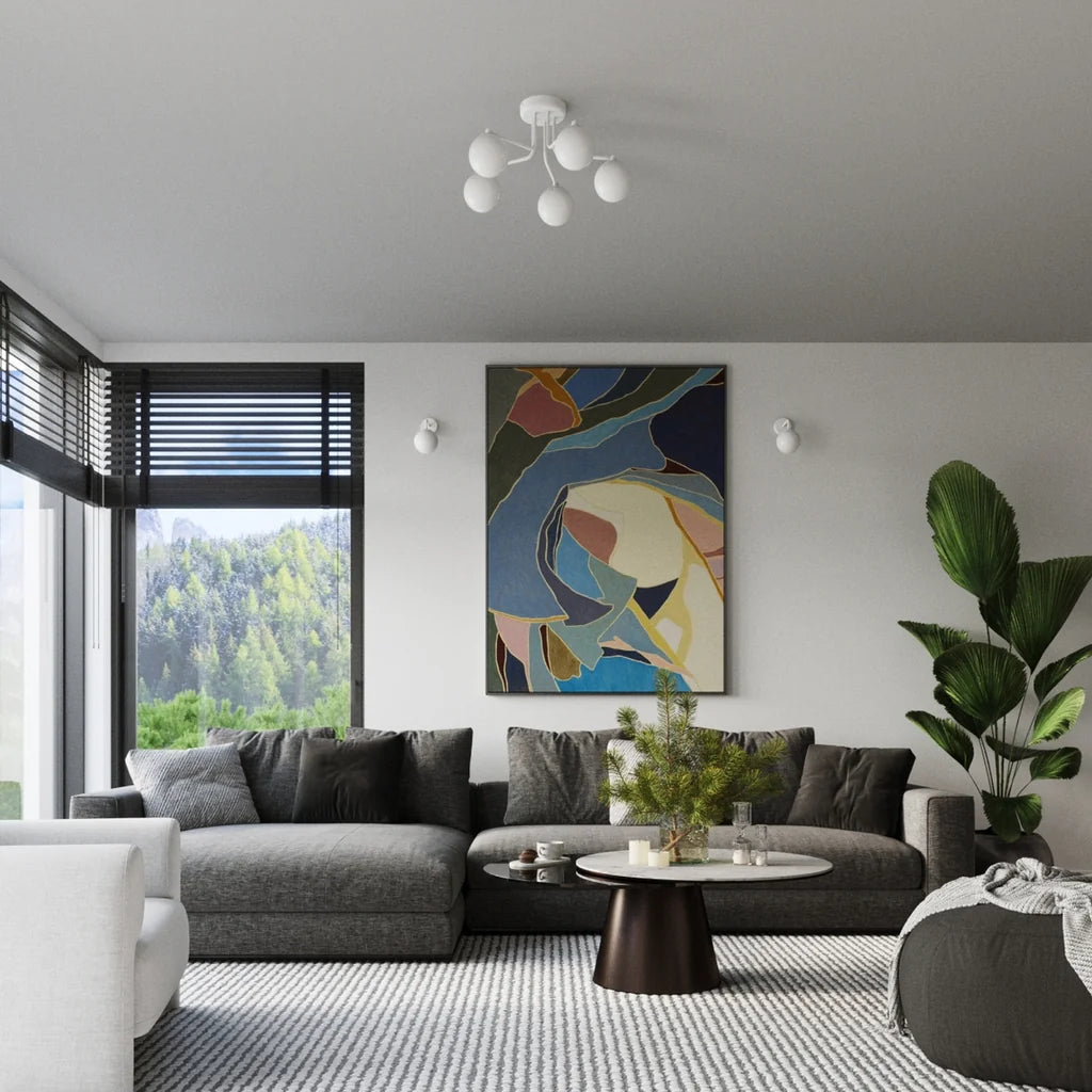 Plafonnier globes opalins sur bras coudés dans un salon