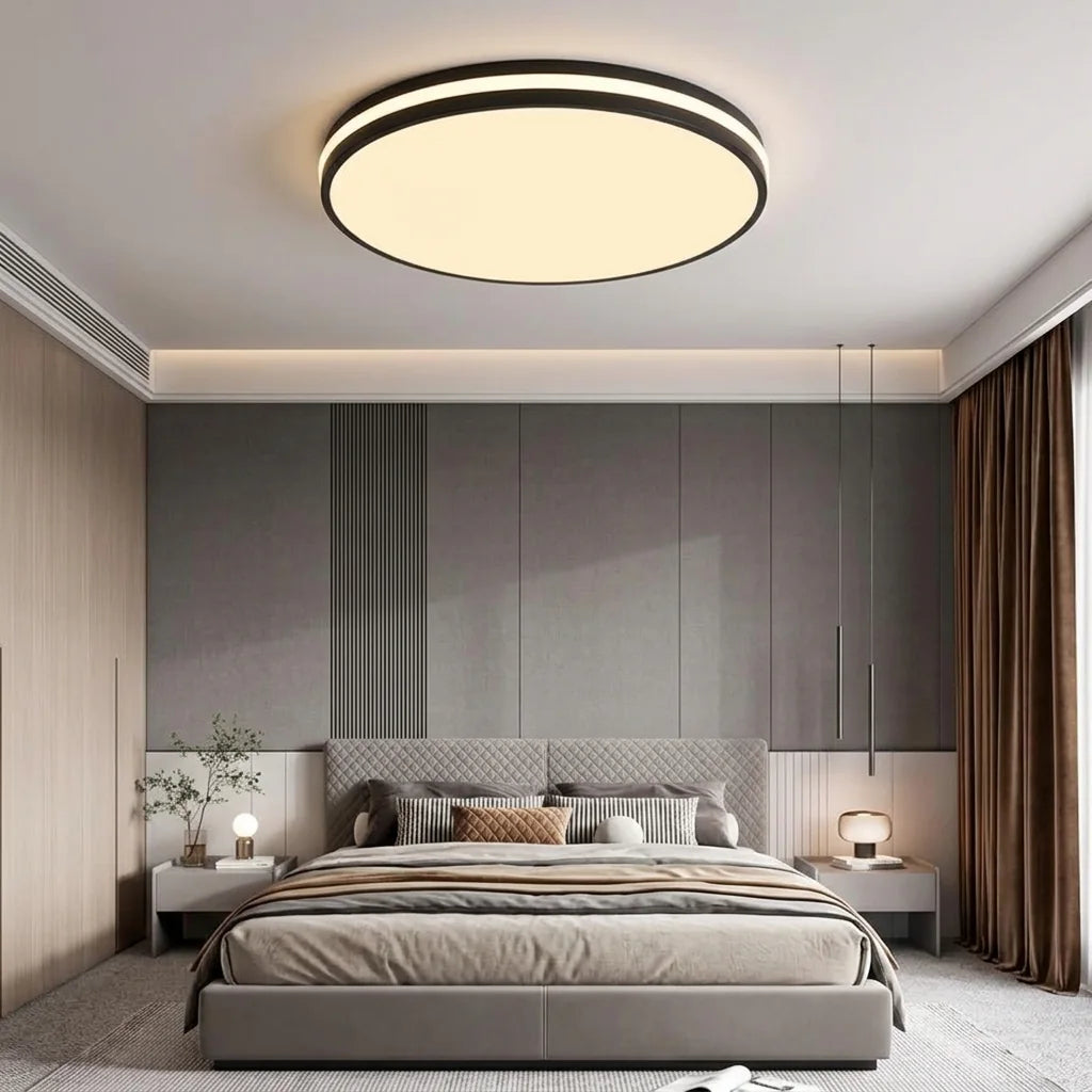 Plafonnier macaron noir dans une chambre moderne