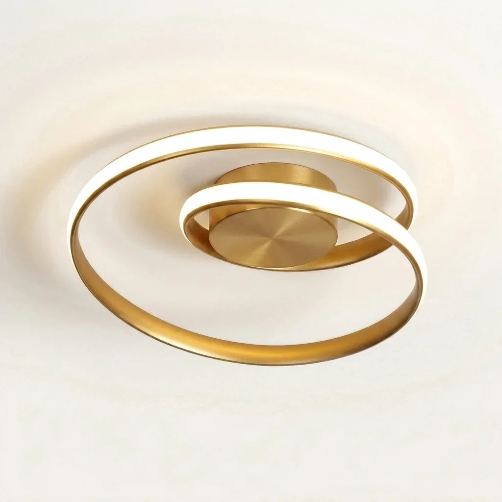 Plafonnier LED spirale doré, allumé