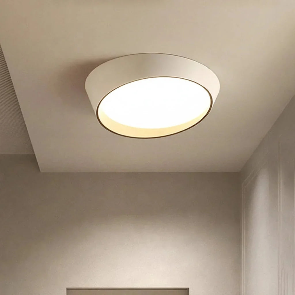 Plafonnier tambour biseauté dans une entrée