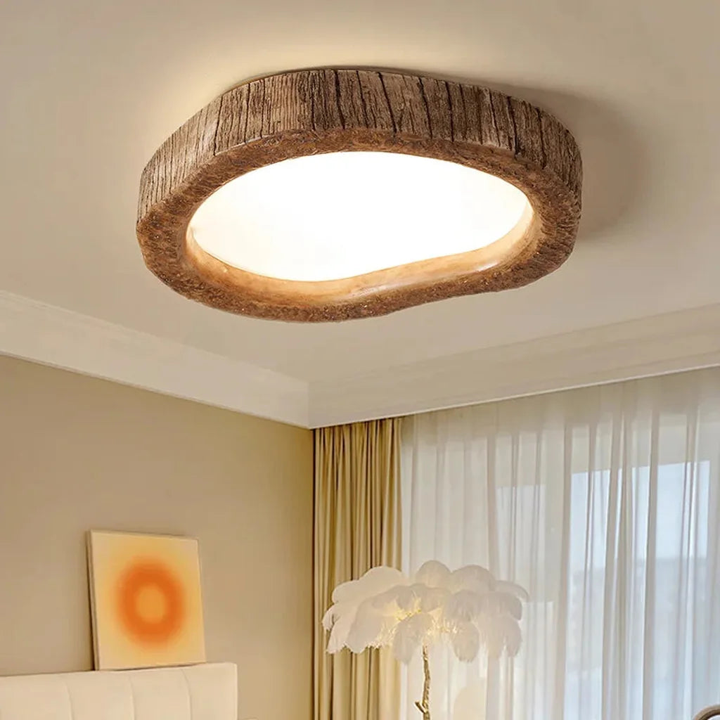 Plafonnier tronc d’arbre dans une chambre