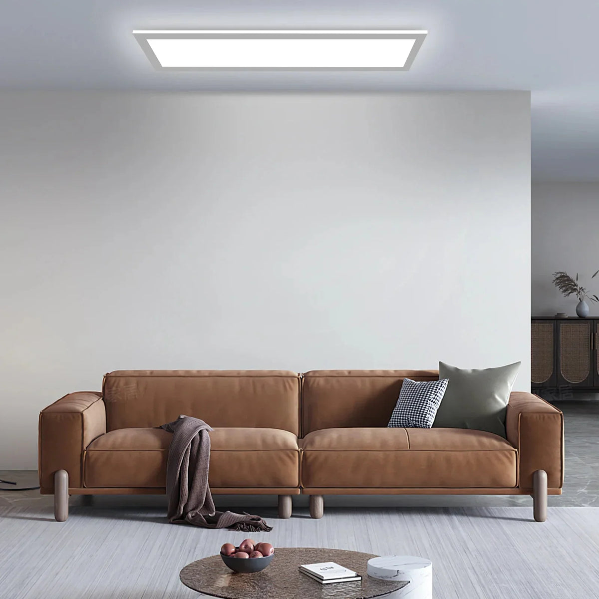 Panneau LED dans un salon avec canapé en cuir