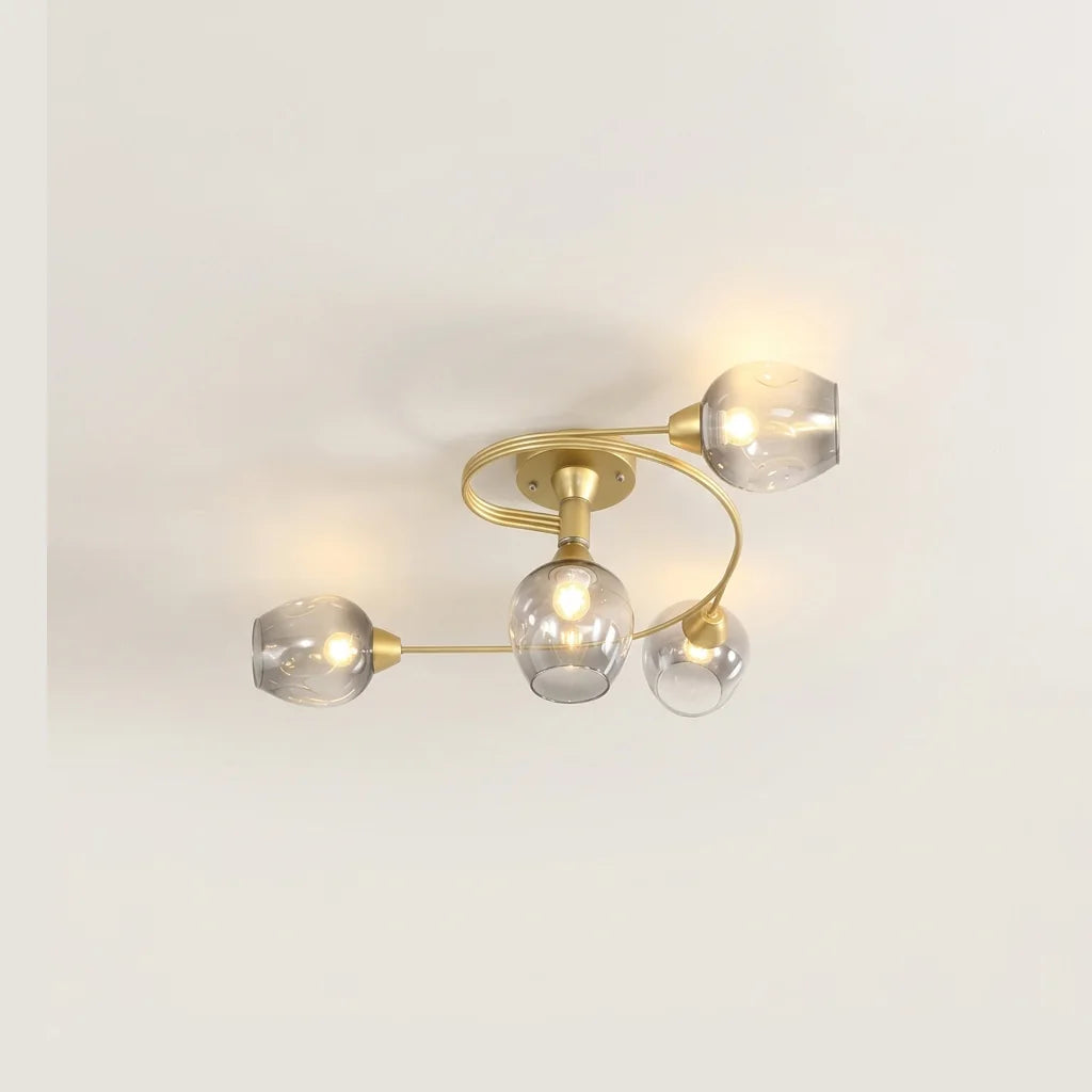 Plafonnier spirale doré 4 têtes à globes en verre