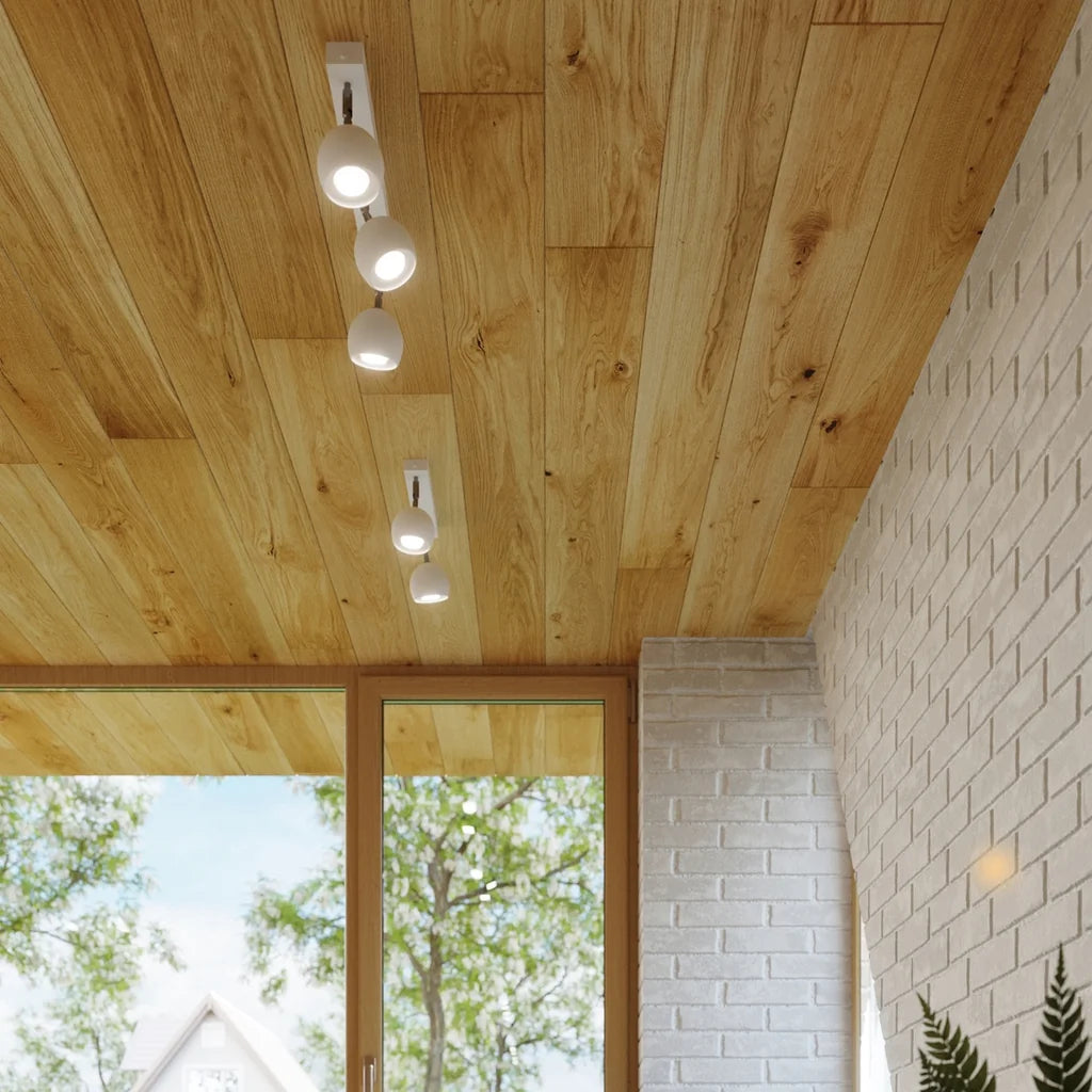 Plafonnier spots boules orientables dans un salon