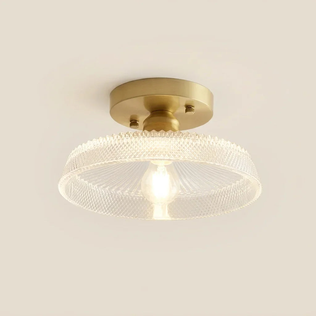 Plafonnier en verre strié transparent à rosace laiton