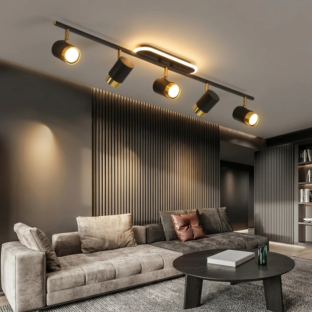 Rampe de spots noire dans un salon moderne