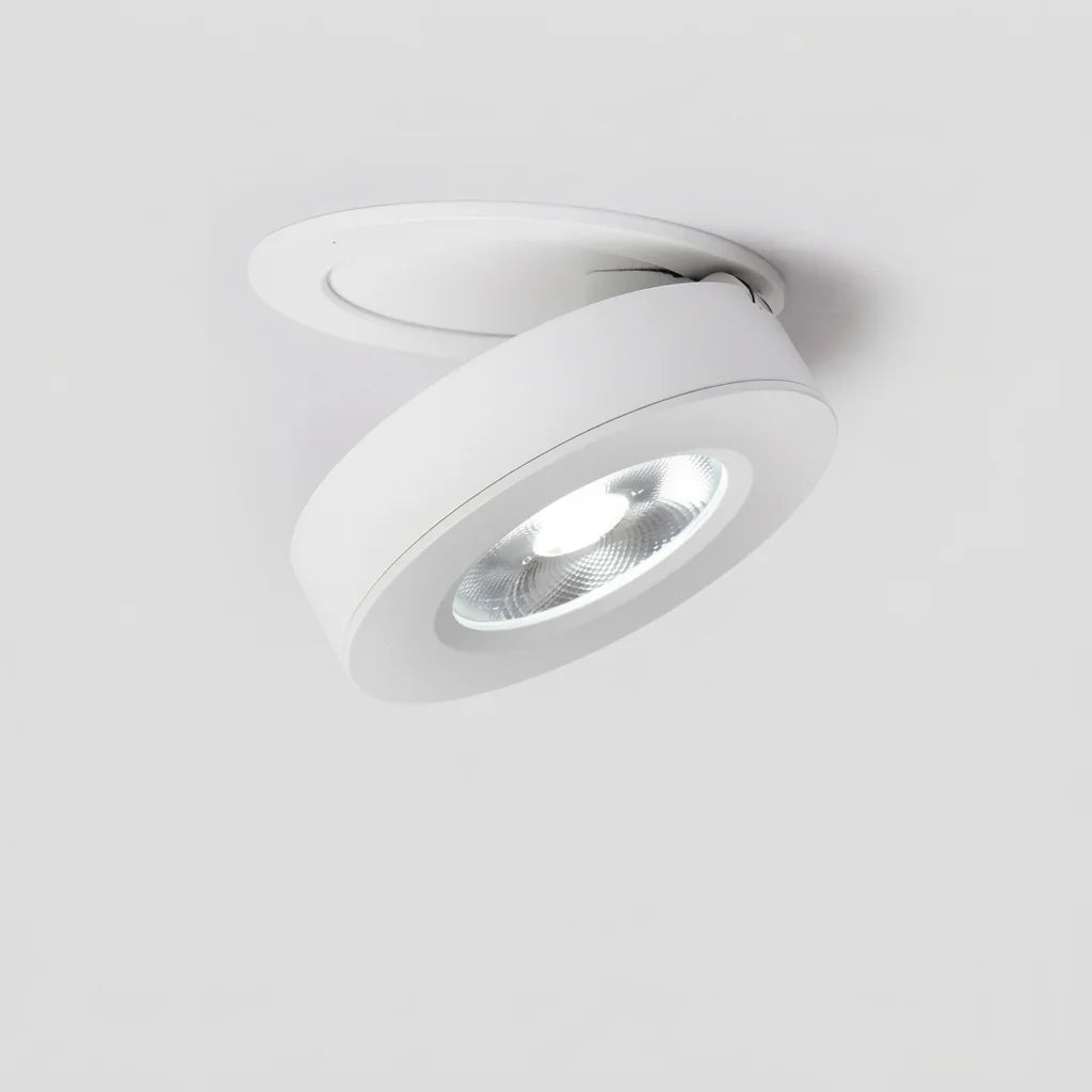 Tête de spot inclinée sortant du plafond