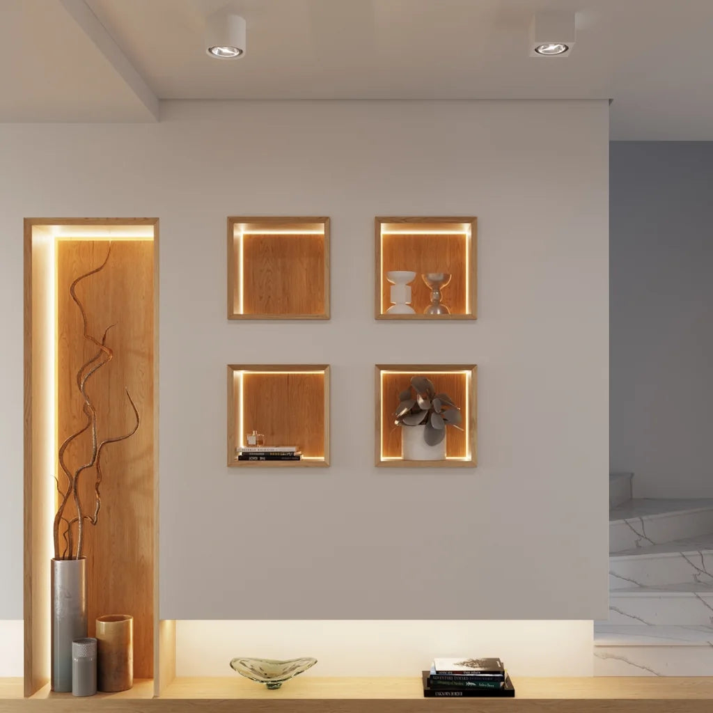 Spot plafond cylindre en céramique blanche dans un couloir