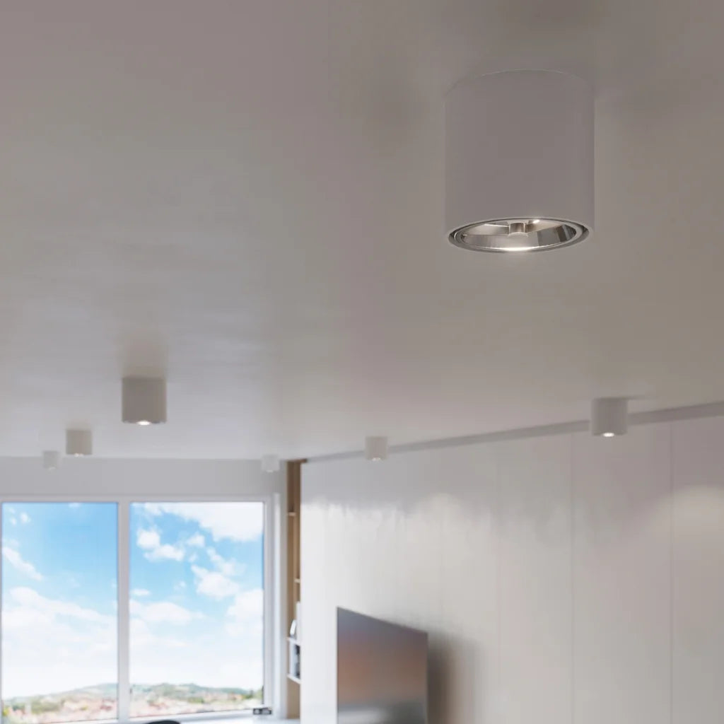 Spot plafond cylindre large ø 12 cm dans un salon
