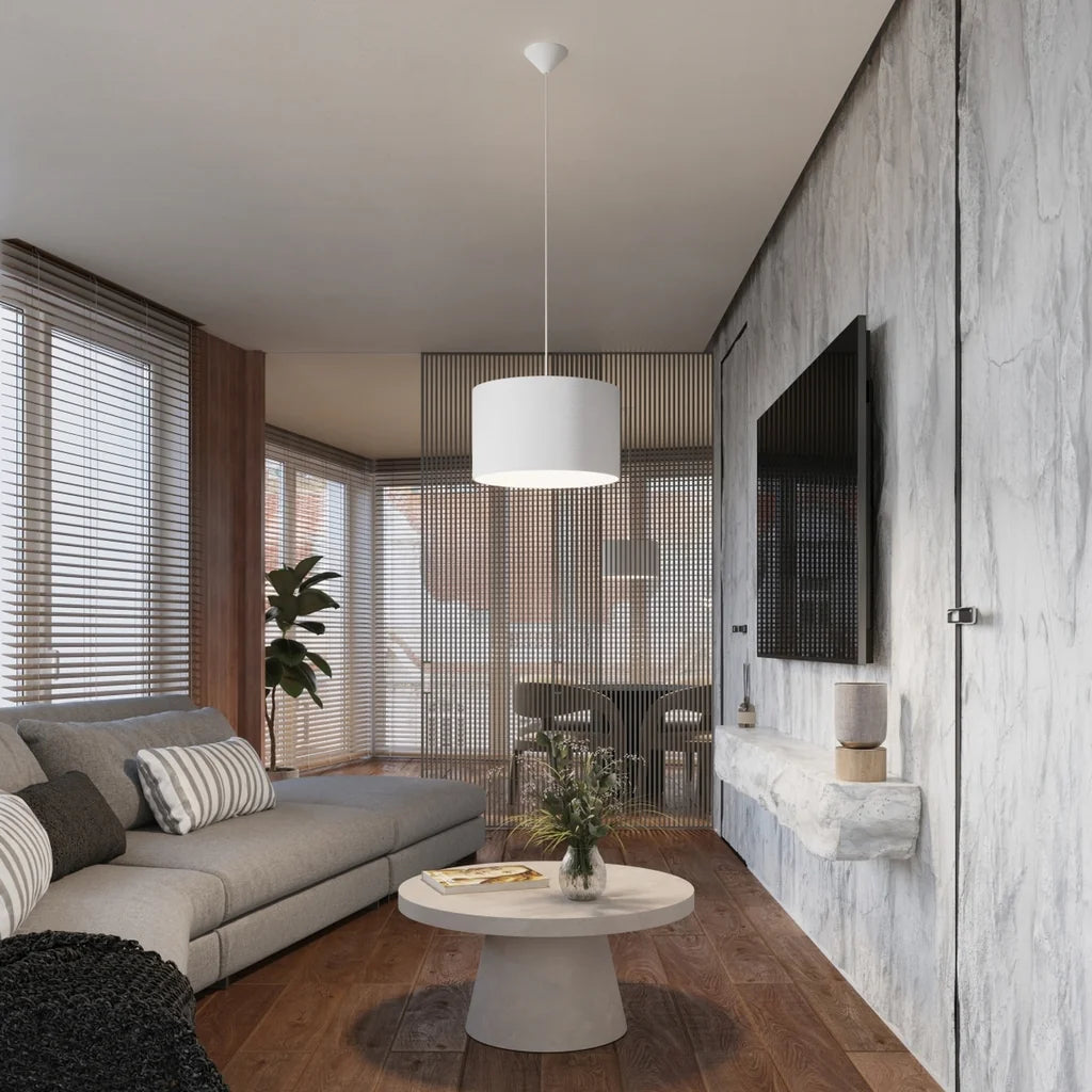 Suspension abat-jour tambour en tissu blanc dans un salon