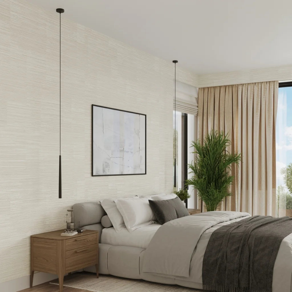 Suspension fuseau noir mat effilé dans une chambre