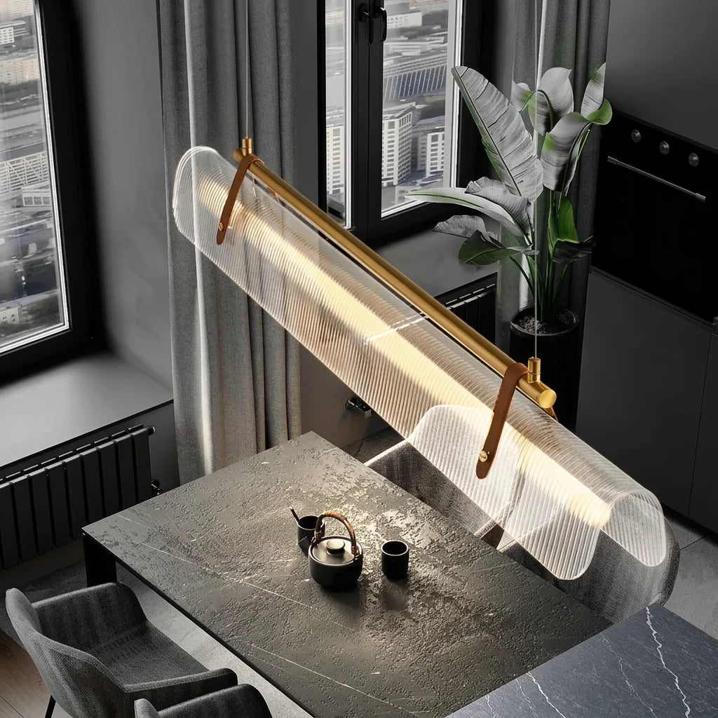 Suspension tube acrylique au-dessus d’une table en pierre