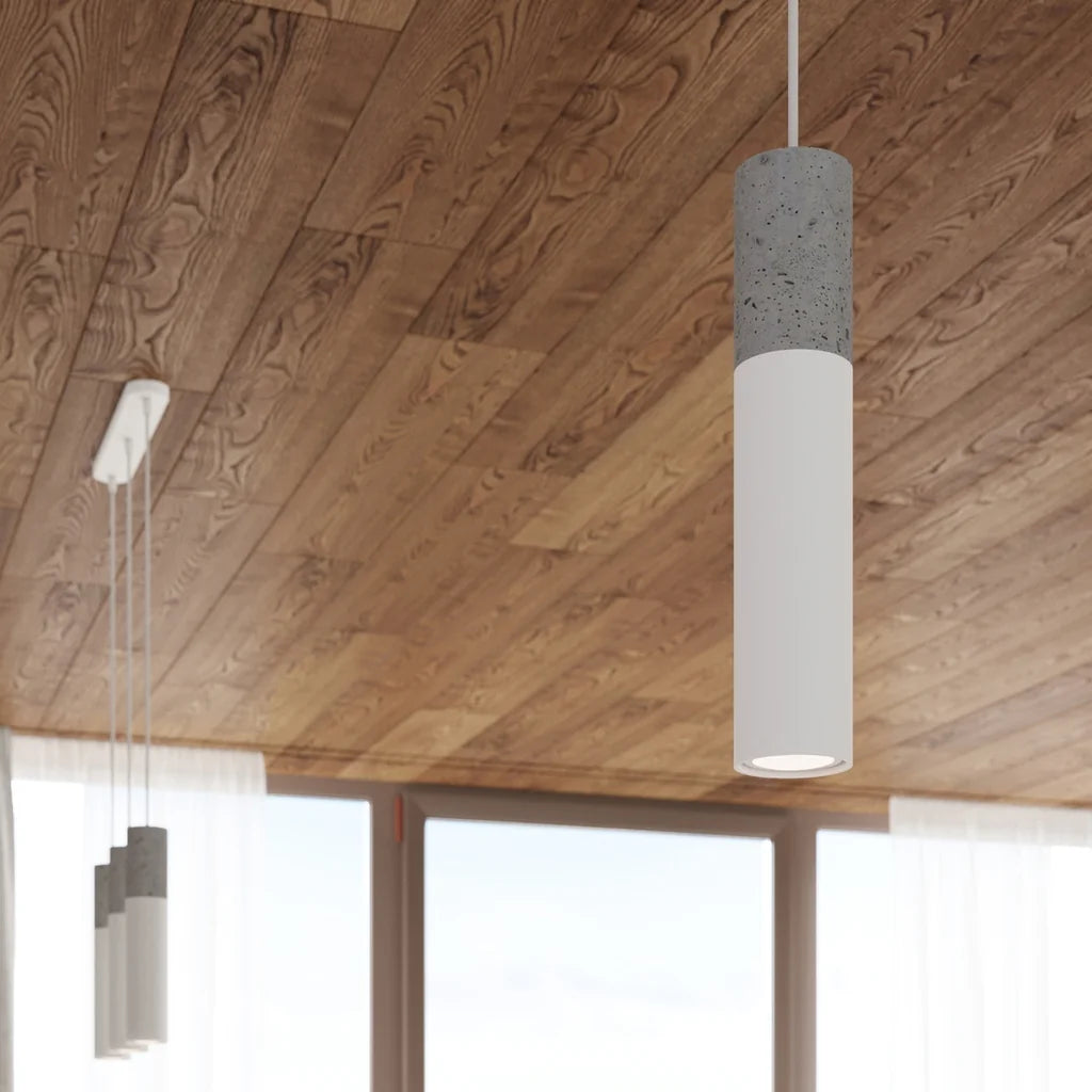 Suspension tube béton et acier dans une cuisine